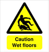 Caution wet floor safety sign, white background with yellow and black graphic and text, various sizes and materials available from signworx.ie 